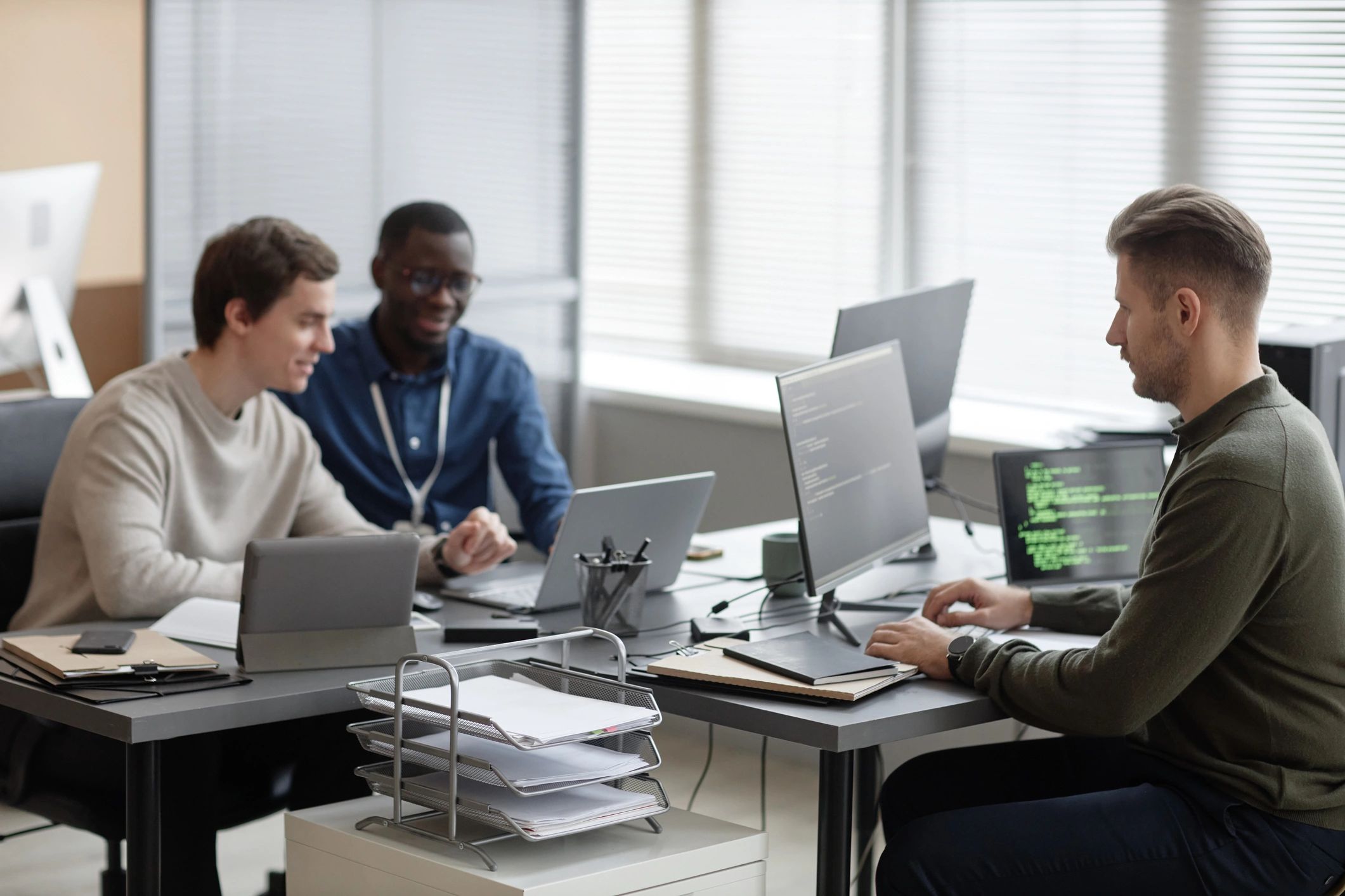 Development team collaborating in a modern studio